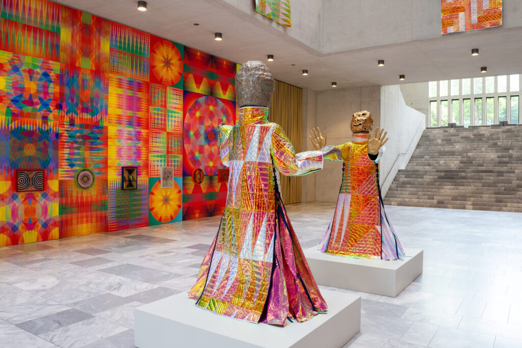 Colourful and geometric art installation by Jeffrey Gibson.